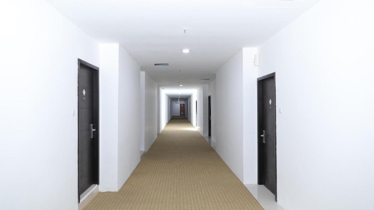 Heavenly Land Family Hotel 巨港 外观 照片