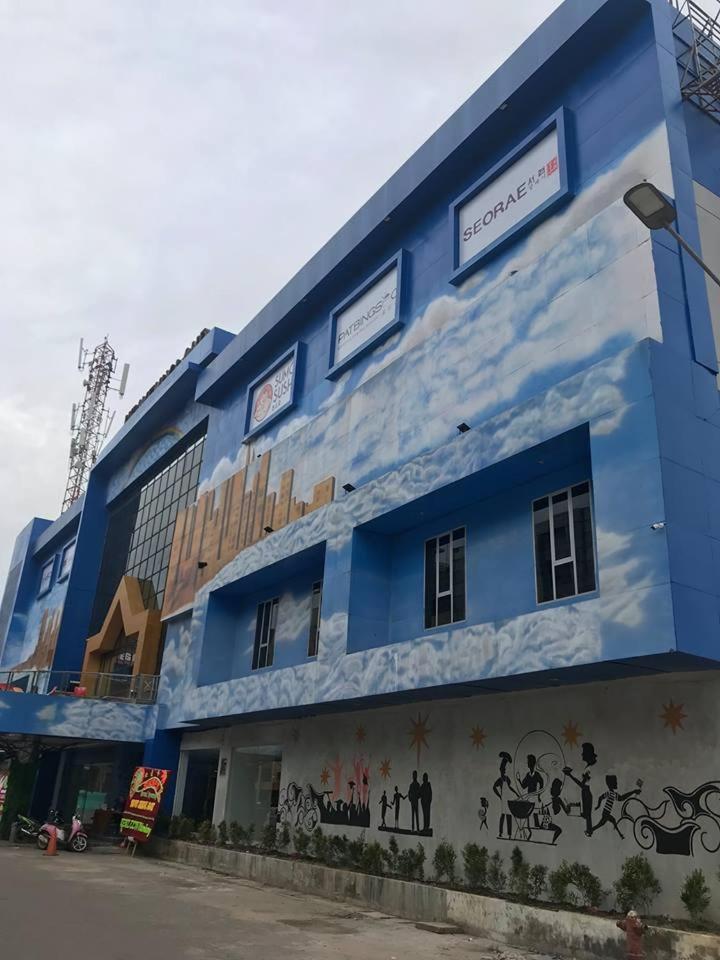 Heavenly Land Family Hotel 巨港 外观 照片