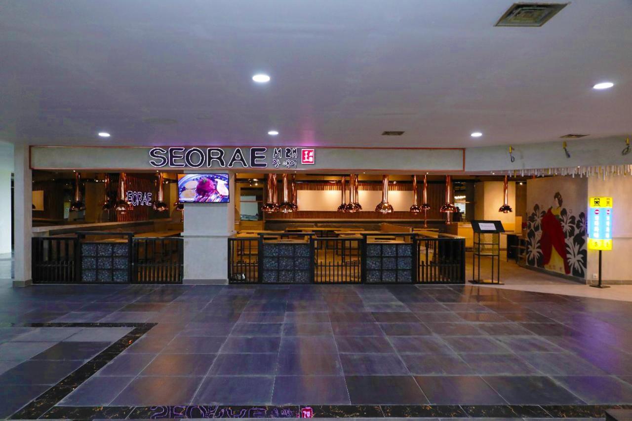 Heavenly Land Family Hotel 巨港 外观 照片